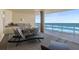 Beachfront balcony with lounge chairs and ocean views at 1925 S Atlantic Ave # 706, Daytona Beach, FL 32118