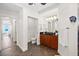 Bathroom with double vanity, toilet and shower at 1925 S Atlantic Ave # 706, Daytona Beach, FL 32118