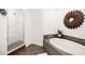 Bathroom with soaking tub, shower and tiled flooring at 1925 S Atlantic Ave # 706, Daytona Beach, FL 32118