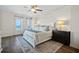 Main bedroom with ocean view, king-size bed, and large windows at 1925 S Atlantic Ave # 706, Daytona Beach, FL 32118