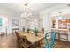 Rustic-chic dining area featuring a wooden table and ocean views at 1925 S Atlantic Ave # 706, Daytona Beach, FL 32118