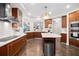Modern kitchen with stainless steel appliances and island at 1925 S Atlantic Ave # 706, Daytona Beach, FL 32118