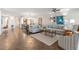 Open living room with ample seating and tile floors at 1925 S Atlantic Ave # 706, Daytona Beach, FL 32118