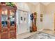 Elegant entryway with stained glass door and hardwood floors at 1937 Spruce Creek Lndg, Port Orange, FL 32128