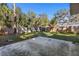 Large backyard with wooden fence and patio at 2125 Queen Palm Dr, Edgewater, FL 32141