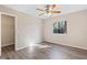 Well-lit bedroom featuring a ceiling fan and closet at 2125 Queen Palm Dr, Edgewater, FL 32141
