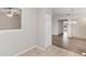 Bright dining area with wood-look floors and access to kitchen at 2125 Queen Palm Dr, Edgewater, FL 32141