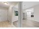 Inviting entryway with view to kitchen and living areas at 2125 Queen Palm Dr, Edgewater, FL 32141