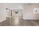 Open concept living area with kitchen access at 2125 Queen Palm Dr, Edgewater, FL 32141