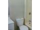 Clean bathroom with a toilet and shower/tub combo at 233 E Davis St, De Leon Springs, FL 32130