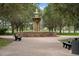 Community area with a beautiful stone fountain and benches at 2815 Sienna View Ter, New Smyrna Beach, FL 32168