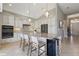 Bright kitchen features granite counters, stainless steel appliances, and a breakfast bar with pendant lighting at 2815 Sienna View Ter, New Smyrna Beach, FL 32168
