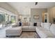 Spacious living room with large sectional sofa and view to the pool and patio at 2815 Sienna View Ter, New Smyrna Beach, FL 32168
