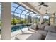 Relaxing screened-in pool area with seating and a water feature at 2815 Sienna View Ter, New Smyrna Beach, FL 32168