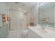 Bathroom featuring a white vanity, tile floor, and shower-tub combo at 3 Oceans West Blvd # 4A5, Daytona Beach Shores, FL 32118