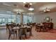Elegant dining room with warm wood floors and plenty of natural light at 3 Oceans West Blvd # 4A5, Daytona Beach Shores, FL 32118