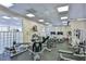 Well-equipped gym with various exercise machines and large windows at 3 Oceans West Blvd # 4A5, Daytona Beach Shores, FL 32118