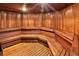 Relaxing wooden sauna with built-in benches and warm lighting at 3 Oceans West Blvd # 4A5, Daytona Beach Shores, FL 32118