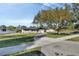 Home with a large tree and driveway at 3070 Grand Ave, Deland, FL 32720