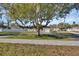House with mature tree and curb appeal at 3070 Grand Ave, Deland, FL 32720
