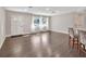 Bright living room featuring hardwood floors and lots of natural light at 3070 Grand Ave, Deland, FL 32720