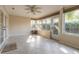 Bright sunroom with tile floors and multiple windows at 32543 Crystal Breeze Ln, Leesburg, FL 34788