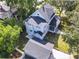 Aerial view of a two-story house with a detached garage at 345 N Clara Ave, Deland, FL 32720