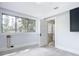 Bedroom with access to a bathroom and window at 345 N Clara Ave, Deland, FL 32720