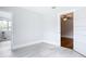 Bright bedroom with hardwood floors, ceiling fan, and access to other rooms at 345 N Clara Ave, Deland, FL 32720