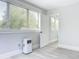 Bedroom with window and door to another room at 345 N Clara Ave, Deland, FL 32720