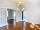 Formal dining room featuring hardwood floors and a chandelier at 345 N Clara Ave, Deland, FL 32720