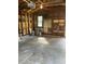 Unfinished garage with wood walls and shelving at 345 N Clara Ave, Deland, FL 32720