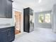 Updated kitchen featuring dark cabinetry and stainless steel appliances at 345 N Clara Ave, Deland, FL 32720
