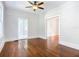 Bright living room with hardwood floors and access to other rooms at 345 N Clara Ave, Deland, FL 32720