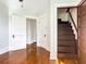 Wooden staircase leading to upper level at 345 N Clara Ave, Deland, FL 32720