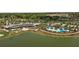 Community clubhouse, pool, and golf course aerial view at 3558 Nw 56Th Ave, Ocala, FL 34482