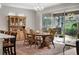 Elegant dining room with hardwood floors and a beautiful hutch at 3558 Nw 56Th Ave, Ocala, FL 34482