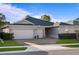 Two-car garage and attractive landscaping at 3558 Nw 56Th Ave, Ocala, FL 34482