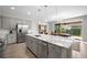 Spacious kitchen with island, granite countertops, and stainless steel appliances at 3558 Nw 56Th Ave, Ocala, FL 34482