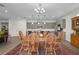 Open concept kitchen with gray cabinets, stainless steel appliances, and an island at 3558 Nw 56Th Ave, Ocala, FL 34482