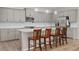 Modern kitchen featuring granite countertops and gray cabinets at 3558 Nw 56Th Ave, Ocala, FL 34482