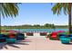 Lakefront patio with comfortable seating and beautiful views at 3558 Nw 56Th Ave, Ocala, FL 34482