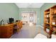 Home office with built-in shelving and a comfortable seating area at 3558 Nw 56Th Ave, Ocala, FL 34482