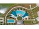 Directly above view of community pool and lake at 3558 Nw 56Th Ave, Ocala, FL 34482