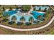 Aerial view of community pool with surrounding landscaping at 3558 Nw 56Th Ave, Ocala, FL 34482