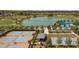 Aerial view of community tennis courts with landscaping at 3558 Nw 56Th Ave, Ocala, FL 34482