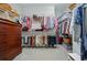 Spacious walk-in closet with ample shelving and hanging space at 3558 Nw 56Th Ave, Ocala, FL 34482