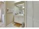 Bathroom featuring a single vanity and a large mirror at 376 Hampton Hills Ct, Debary, FL 32713