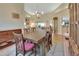 Spacious dining area with hardwood floors and a view of the living room at 376 Hampton Hills Ct, Debary, FL 32713