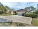 Single-story home with attached garage and landscaped yard at 376 Hampton Hills Ct, Debary, FL 32713